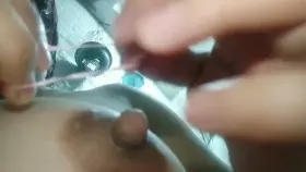 this is how I put rubber hair ties on my nipples [F]