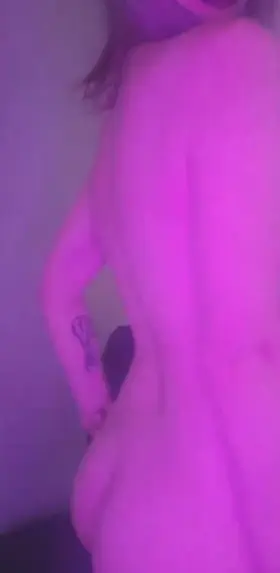 Nothing but black lipstick and a choker, what do you think?