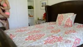 Ashley Adams carries blonde petite Piper Perri for a make out session on bed.