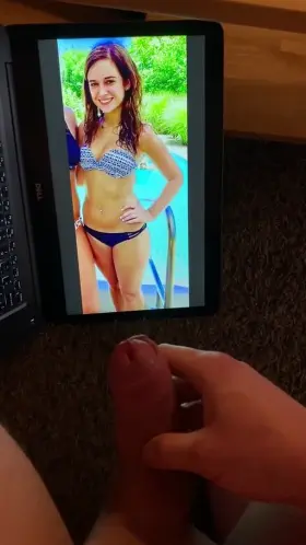 Cheerleader babe made me cum. I couldn’t help it. Her hips... her thighs... I couldn’t handle her tight sexy body in a bikini that small...