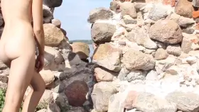 Hiding From Tourists Behind The Wall