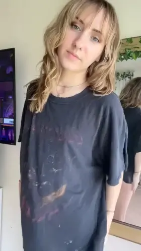 This beautiful 19 year old woman shows off her petite body