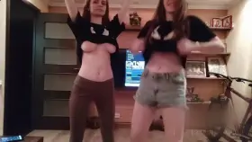 Slim and busty redhead with her friend