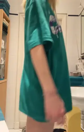 Did you expect what the oversized shirt hid?