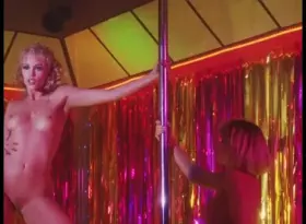Elizabeth Berkley grinding her bare pussy lips on Rena Riffel's leg in Showgirls