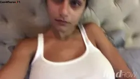 Massaging her big tits