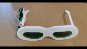 I've once again updated my remote-controlled blindfold project! Did away with the microcontroller altogether, but the loss of logic comes with a massive increase in mobility, so it's finally completely mobile, no need to stay tethered to a box-o-circuitry! All parts 3D modelled and printed by me.