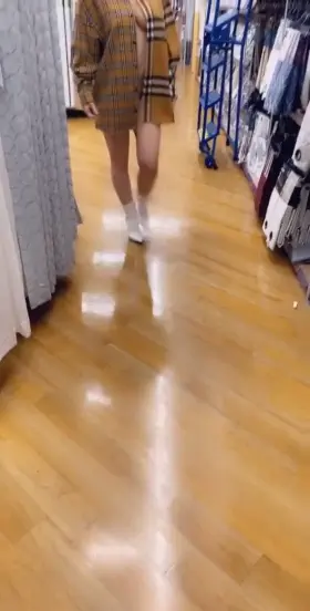 Perfect girl showing off in the store