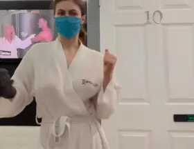 Alexandra Daddario - Braless under a robe