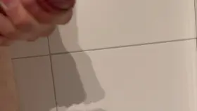 Squeezing some precum out of my half boner