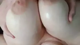 Rubbing it in after a good titty fuck