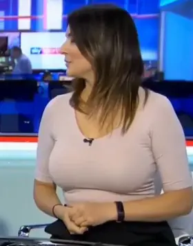 Busty news anchor