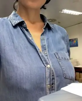 flashing her huge boobs in the office