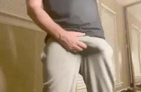 Bulging in gray sweats