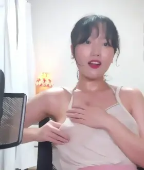 Korean girl shows off her hard nipples