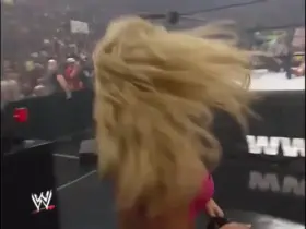 Trish Stratus in a pink bra