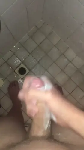 I love stroking my dick in the shower whilst I hear my roommates talk on the other side of the wall