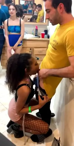 Scarlit Scandal sucking white dick in front of others