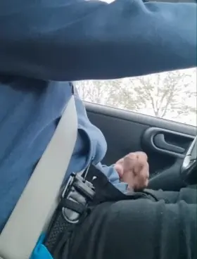 Tugging on my semi-erect cock on the way home from work.