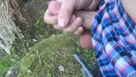 Jacking off and cumming by the river