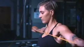 Rhea Ripley and her big naturals work out