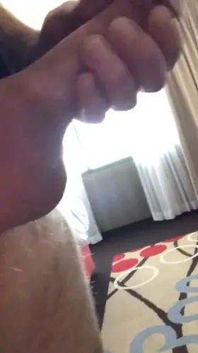 Stroking my fat monster cock in a hotel room in Reno 😈🍆