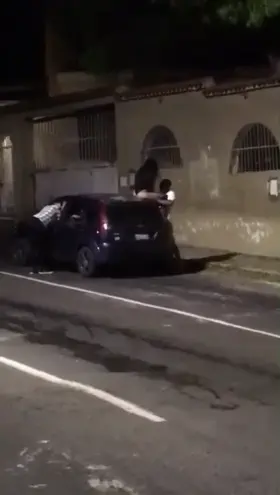 Eating Her on Top of a Car in The Middle of The Street