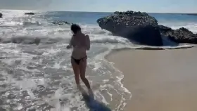 The beach was crowded but I never miss a chance to show off