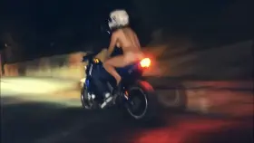 Riding bike with boobs out