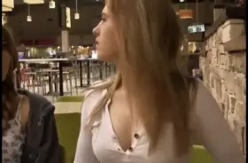 Taking Off Her Bra At A Restaurant