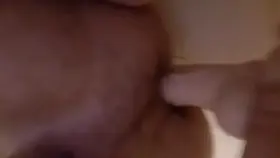 Playing with a dildo