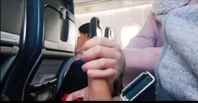 Handjob on a plane next to people [0:00]