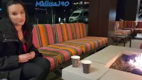 Showing my boobs by the hotels fire pit