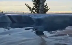 Cue the Jaws theme music (41f 36A boobs in the hot tub)