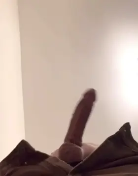 In a crowded public Restroom Stall.