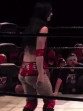 Priscilla in her red attire