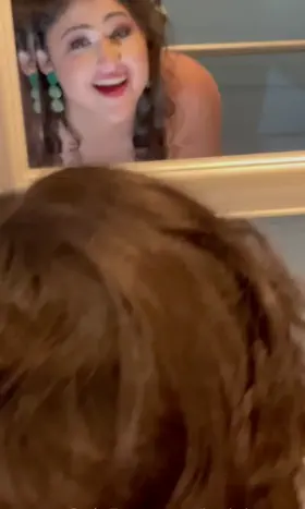 Watching my face in the mirror as he fucks me