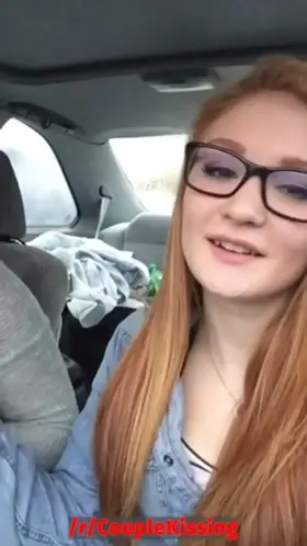 Two cute lesbians kissing passionately in the car