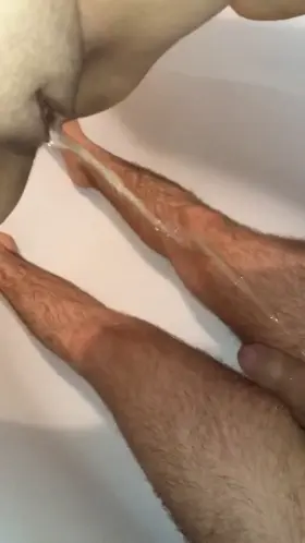 Making his cock and body a bit wet