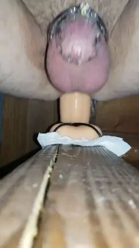 On all 4s getting reamed by fat dildo