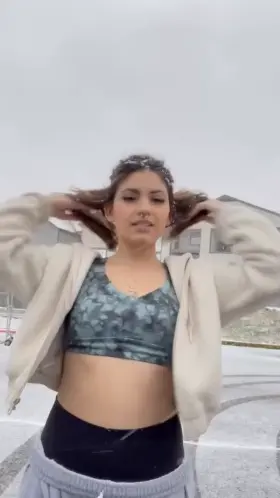 Flashing my tiny tits in the snow storm!