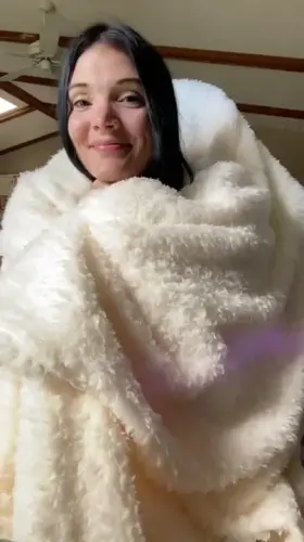 Soft girl wrapped in a softer blanket :)