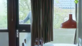 The woman has a visitor and didn't feel the need to cover up (Natalie Visser 2012 Dutch TV series 