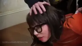 Velma From Scooby Doo Cosplayer tied up on the floor