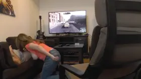 Sucking her BF while he plays Xbox