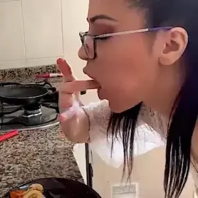 Brunette w/ glasses cooks & fucks her dildo