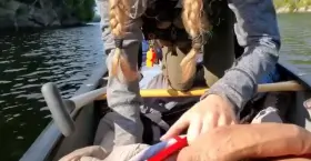 Playing with his huge cock in the lake