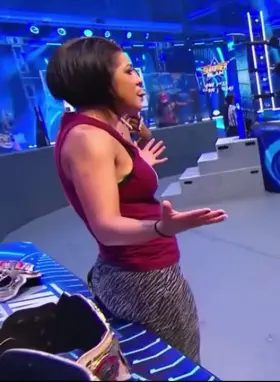 Bayley with her big ass almost busting out of her tights