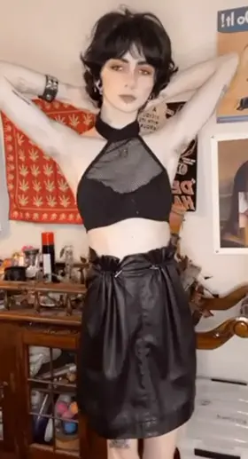 lay back and watch a pretty trans boy strip for you