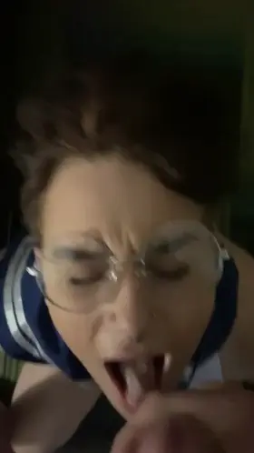 girl with glasses takes a huge load to the face